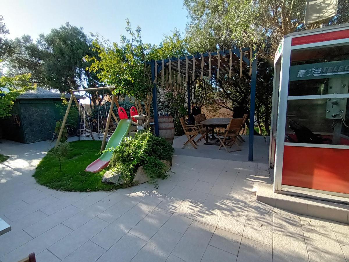 Portopollo Surfhouse Barrabisa Экстерьер фото